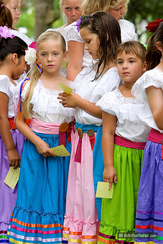 Girls wait in line to get a rose for El Presidente Girls wait in line to get a rose for El Presidente